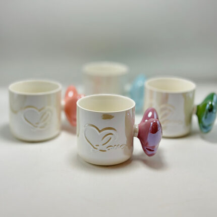 Mug avec des poignées en forme de papillon