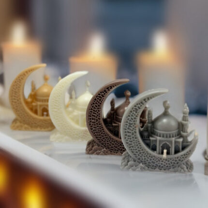 Bougie parfumée en forme de croissant lunaire avec une mosquée