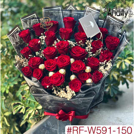 Bouquet de fleurs assis ( sur socle ) avec chocolats